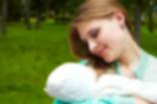 Фото пушистой счастливой матери. Blur — стоковое фото