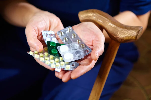 Hands with pills — Stock Photo, Image