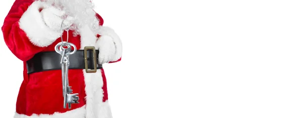 Papai Noel com chave de casa — Fotografia de Stock