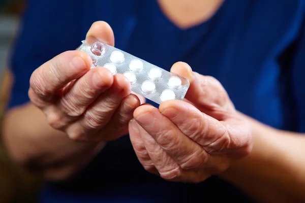 Hands with pills — Stock Photo, Image