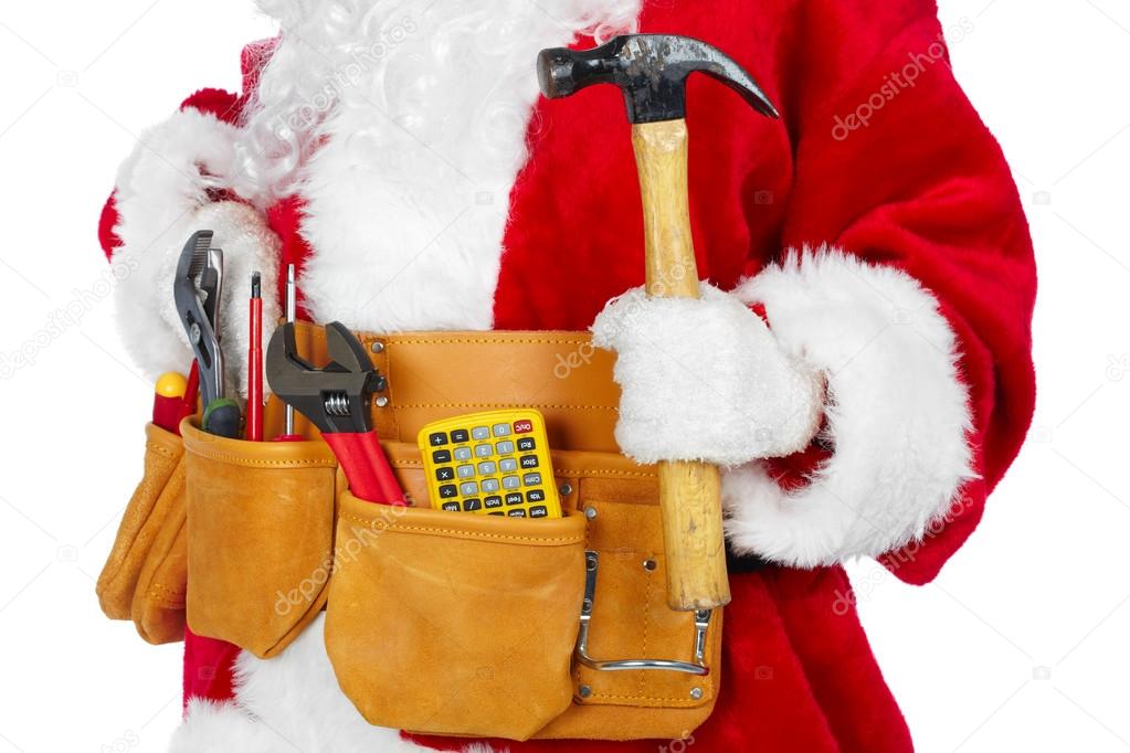 Santa Claus with a tool belt. Stock Photo by ©petrkurgan 59541535