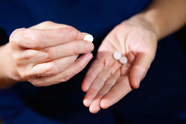 Руки з таблетки — стокове фото