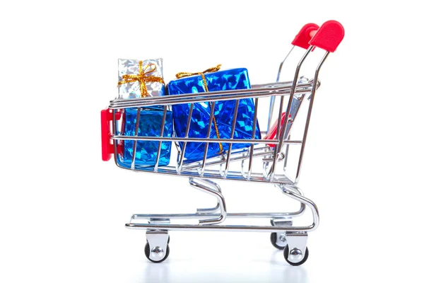 Christmas toys in shopping cart — Stock Photo, Image