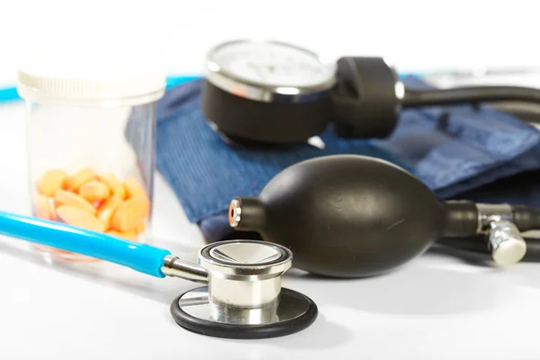 Phonendoscope and pill — Stock Photo, Image