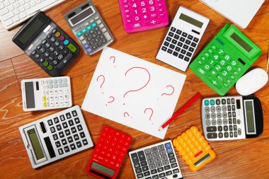 Question mark and calculators clipart