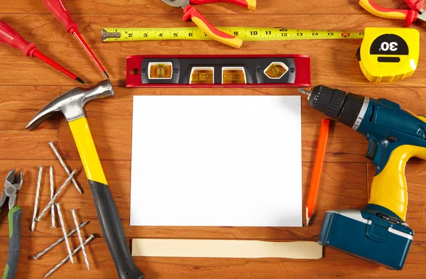 Construction tools on the wooden floor — Stock Photo, Image