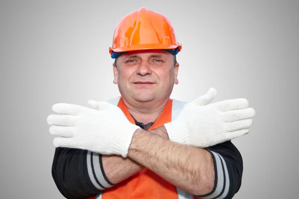 Bauunternehmer zeigt Geste — Stockfoto