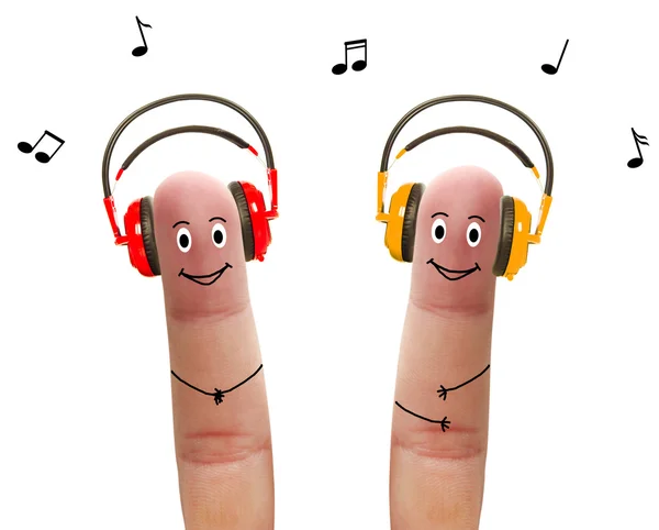 Happy fingers in headphones — Stock Photo, Image