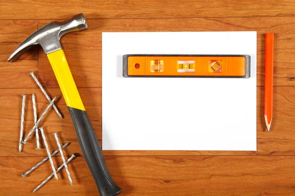 Construction tools on the wooden floor — Stock Photo, Image