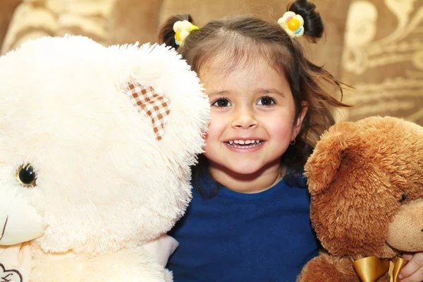 Little girl and teddy bear — Stock Photo, Image