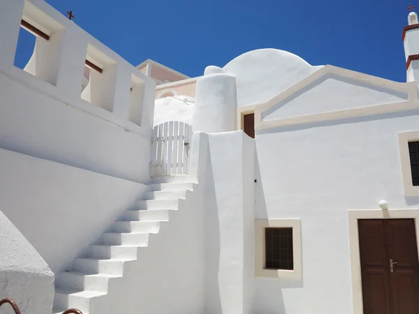 Romántico hermoso paisaje urbano y el cielo azul de Oia en Santorini en — Foto de Stock