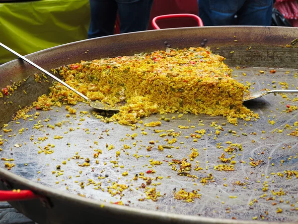 Paella on giant frying pan done at the carnival — Stock Photo, Image