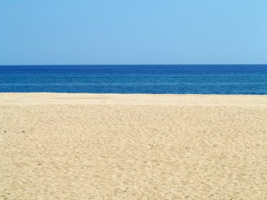 Empty sea and sand beach background on Costa Brava, Spain clipart