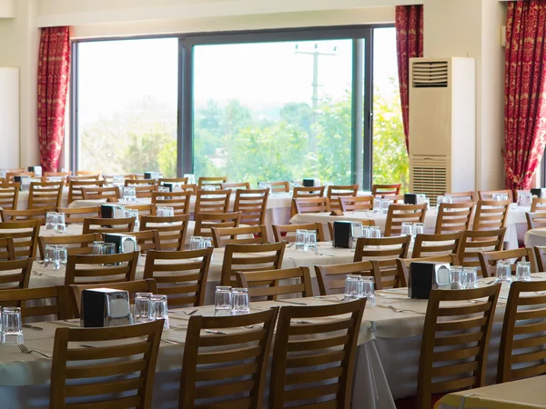 Simply dining room with tables and chairs — Stock Photo, Image