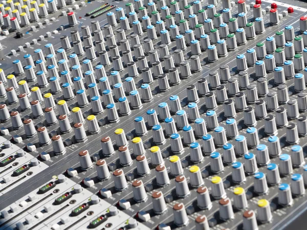 Giant audio sound mixer with color buttons and sliders — Stock Photo, Image