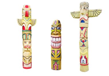 Wooden indian colorful totem pole isolated on white clipart