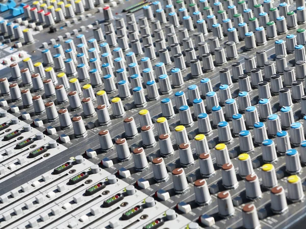 Giant audio sound mixer with color buttons and sliders — Stock Photo, Image