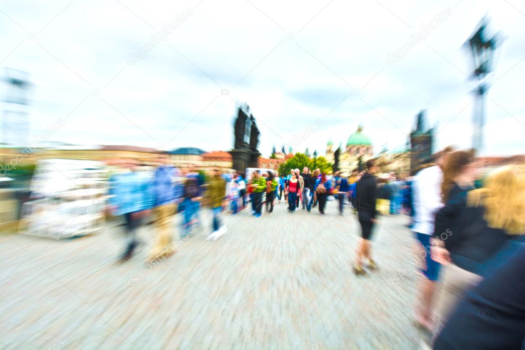 Crowd of tourists on the Charles Bridge in Prague.