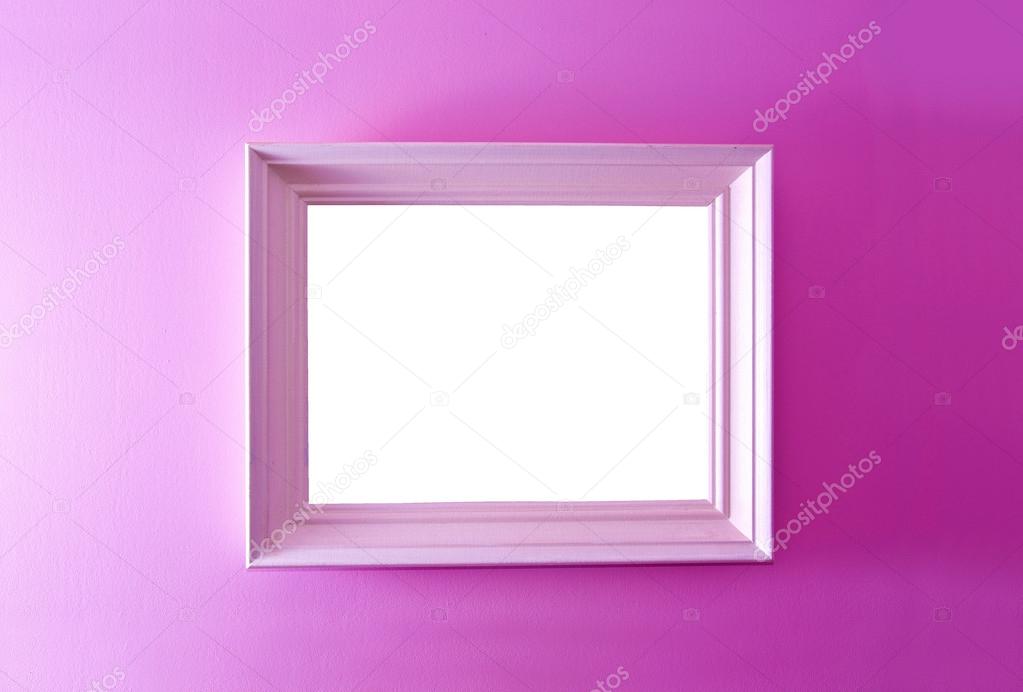 White empty frame on the pink wall.