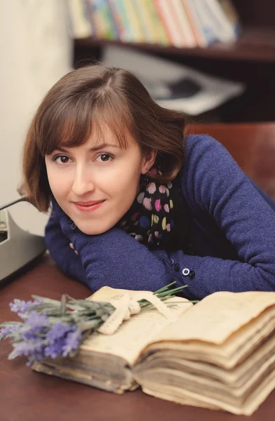 Writer in the library — Stock Photo, Image