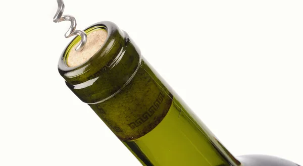 Corkscrew with a bottle of wine isolated on a white background — Stock Photo, Image