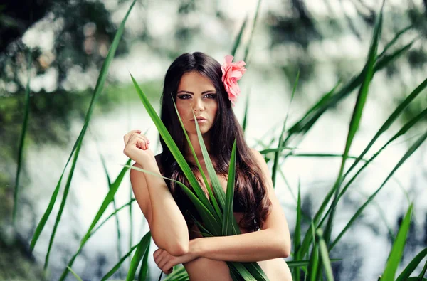 Sexy brunette woman in water. summer season — Stock Photo, Image