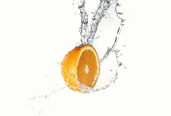 Citroen met water splash — Stockfoto