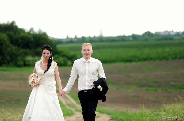 Bride and groom having a romantic moment on their wedding — Stock Photo, Image