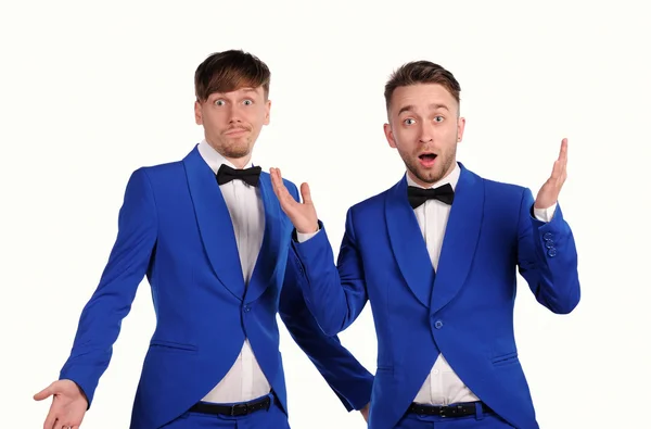 Funny men  dressed in blue suite with different emotions Royalty Free Stock Images