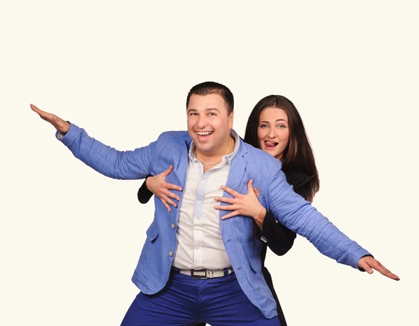 Man and woman with funny faces isolated over white background — Stock Photo, Image