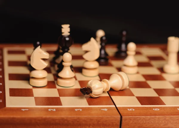 Wooden chess pieces — Stock Photo, Image