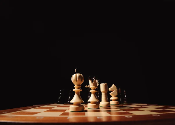 Wooden chess pieces — Stock Photo, Image