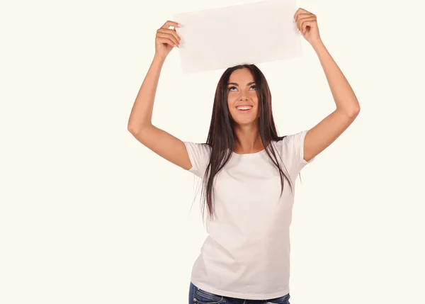 Beautiful girl holding a blank billboard — Stock Photo, Image