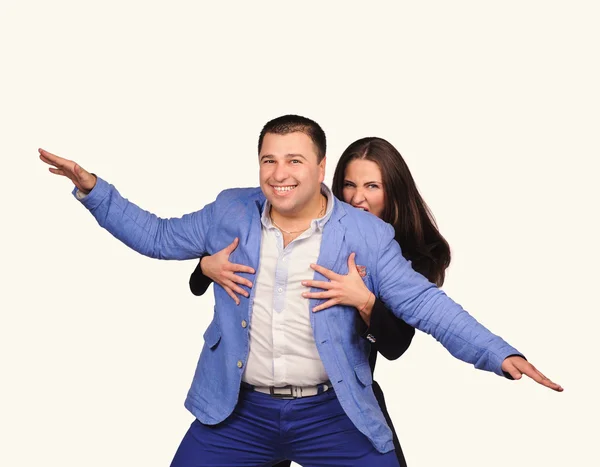 Man and woman with funny faces isolated over white background — Stock Photo, Image