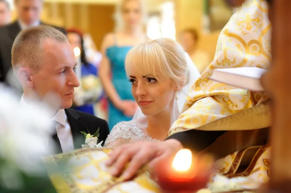 Bride and groom in the church — Stock Photo, Image