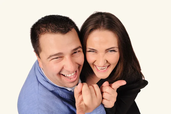 Man en vrouw met grappige gezichten geïsoleerd op witte achtergrond — Stockfoto