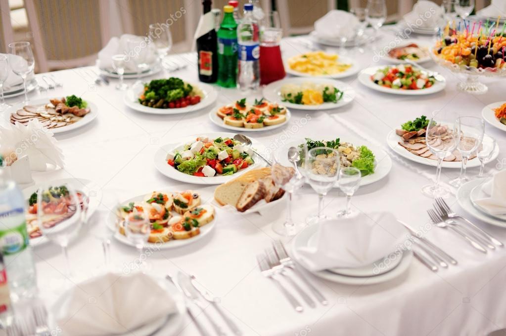 table set service with silverware and glass stemware at restaura