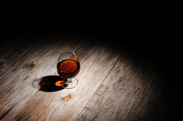 Cognac on the wooden table — Stock Photo, Image