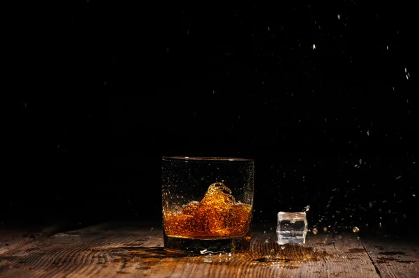 Cognac on the wooden table — Stock Photo, Image