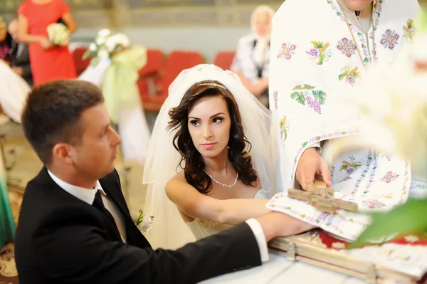 Bride and groom in the church — Stock Photo, Image