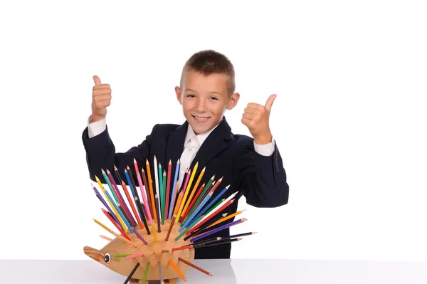Schoolboy with pencils — Stock Photo, Image