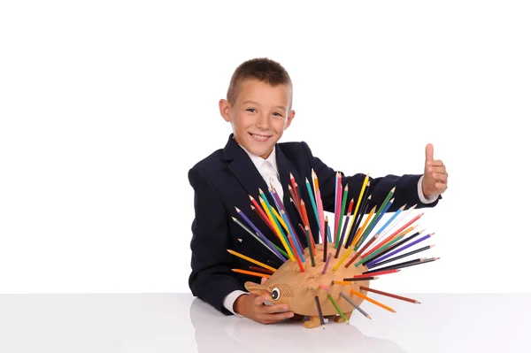 Schoolboy with pencils — Stock Photo, Image