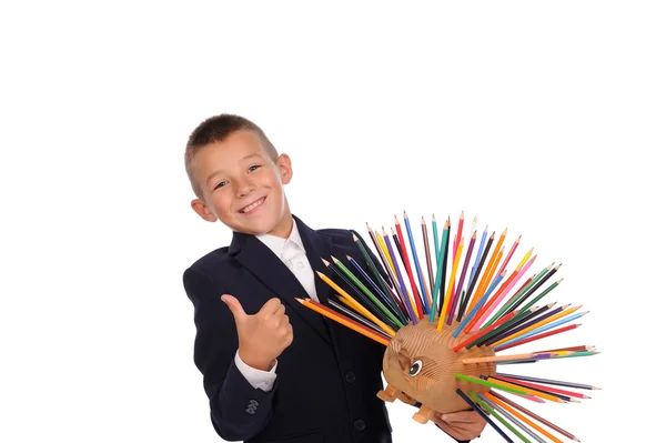 Schooljongen met potloden — Stockfoto