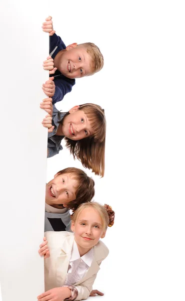 Portrait of happy children with white blank — Stock Photo, Image