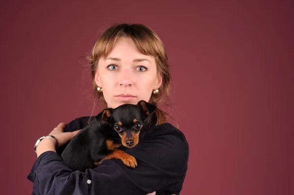 Ragazza con cucciolo — Foto Stock