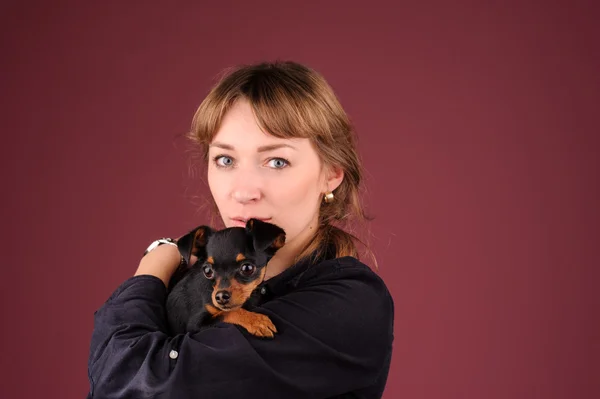 Chica con cachorro — Foto de Stock