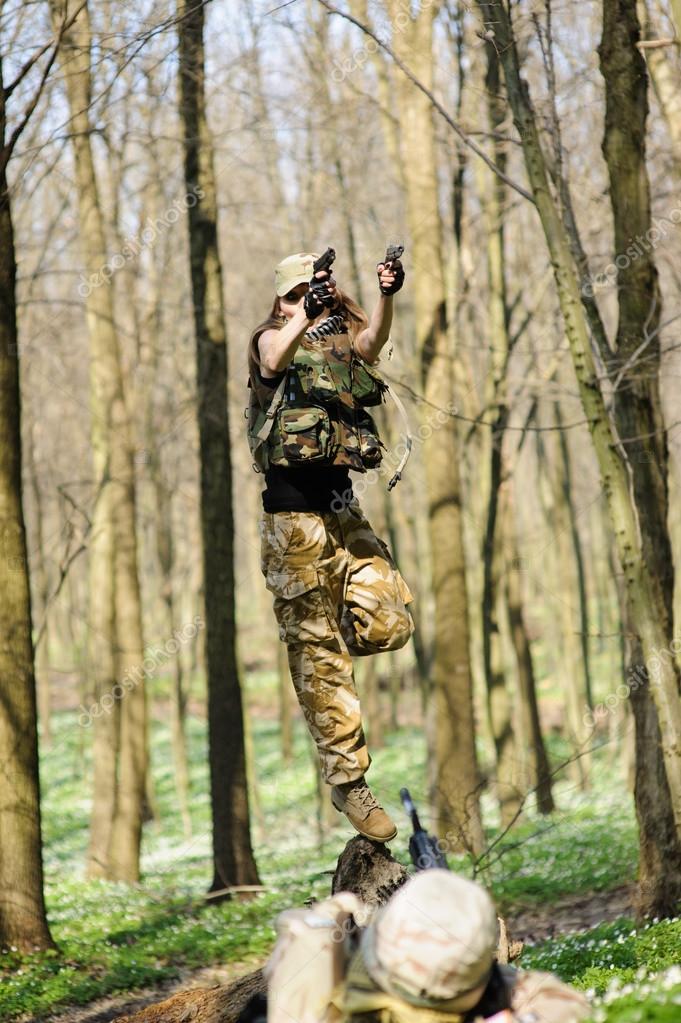 Beautiful army girl with gun — Stock Photo © art_man #69716879