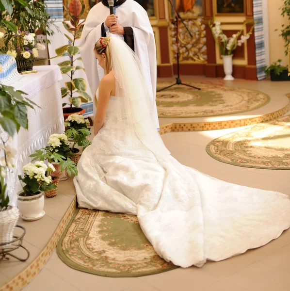 Bride and groom in the church — Stock Photo, Image