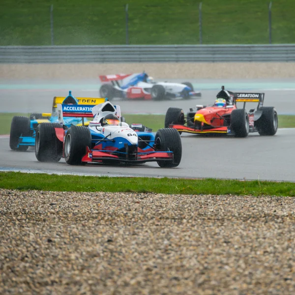 Formula FA1 cars during the warm up lap — Stock Photo, Image