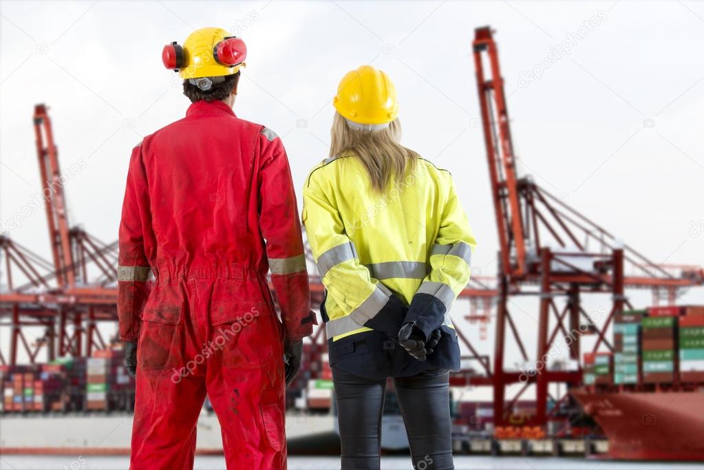 Two dockers in hard hats